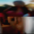 Man massaging nude woman