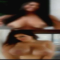 Nude woman putting tampon
