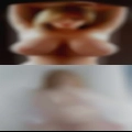 Naked woman riding snowmobile